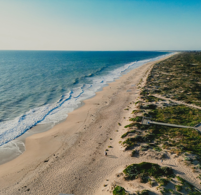 contact us - beach aerial view