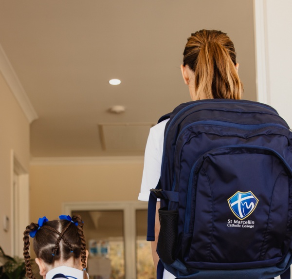 parent with kid backpack