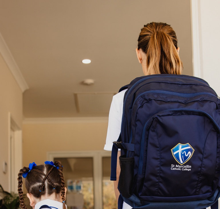 parent with kid backpack